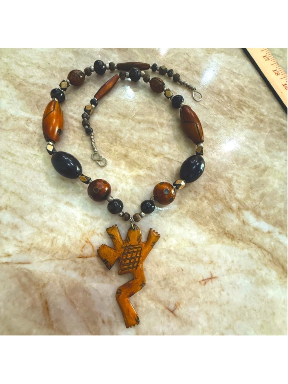 Handcrafted Wooden and Black Beaded Necklace with carved frog. Made in India.